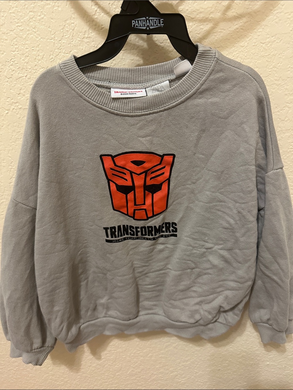 ZARA Gray Sweatshirt with Orange Transformers Emblem